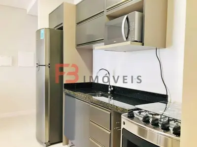 A cozinha ou kitchenette de Apartamento praia Bombas