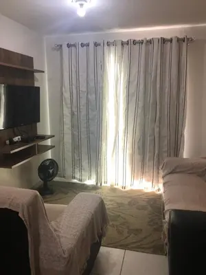 Uma área de estar em Bombinhas Residencial Ecomar