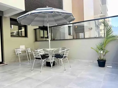 Um pátio ou outra área exterior em Garden! Apto com área externa privativa