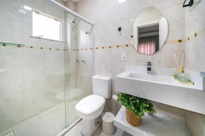 Uma casa de banho em Lindo apartamento na Avenida