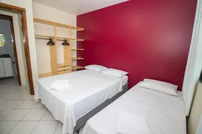 Uma cama ou camas num quarto em Residencial Andorinhas