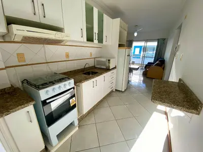 A cozinha ou kitchenette de Apartamento com piscina Bombas