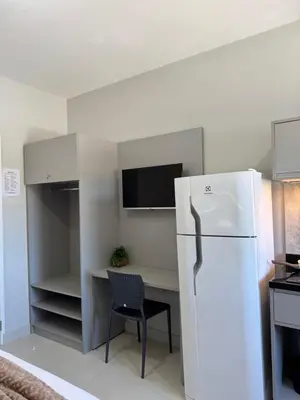 A cozinha ou kitchenette de Novíssimo studio para casal