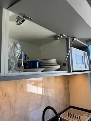 A cozinha ou kitchenette de Novíssimo studio para casal
