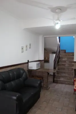 Uma área de estar em Apartamento Costa Esmeralda