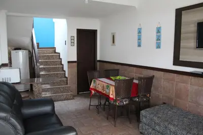Uma área de estar em Apartamento Costa Esmeralda