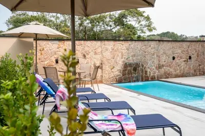 A piscina em ou perto de Pousada Caminho do Bosque