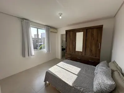 Uma cama ou camas num quarto em Apartamento com Suite em Palmas