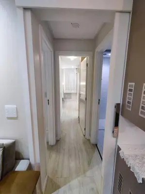 Uma cama ou camas num quarto em Apartamento Camboriú