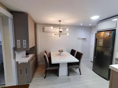 A cozinha ou kitchenette de Apartamento Camboriú