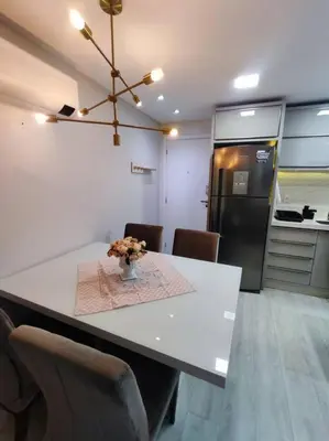 A cozinha ou kitchenette de Apartamento Camboriú