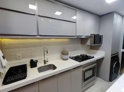 A cozinha ou kitchenette de Apartamento Camboriú