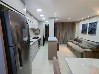 A cozinha ou kitchenette de Apartamento Camboriú