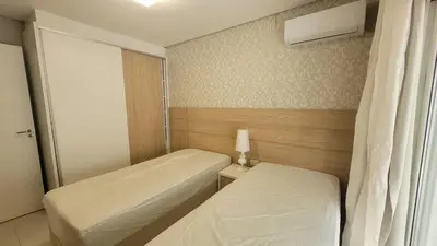 Uma cama ou camas num quarto em B164 - Apto na praia da Lagoinha para Alugar