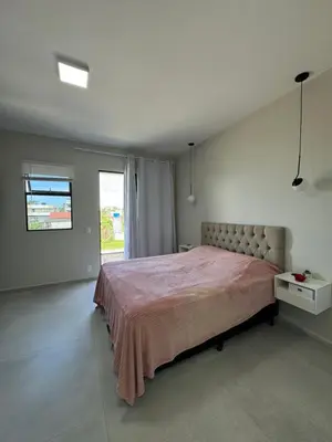 Uma cama ou camas num quarto em Casa Diamante