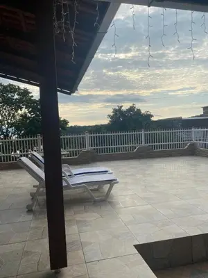 Uma varanda ou terraço em Casa na Praia Araçá