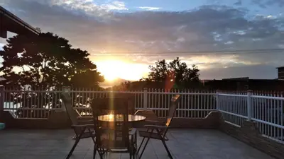 Uma varanda ou terraço em Casa na Praia Araçá