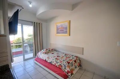 Uma cama ou camas num quarto em Residencial Rouxinol