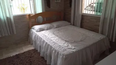 Uma cama ou camas num quarto em House of Cesar