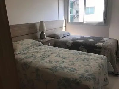 Uma cama ou camas num quarto em Cód 113 - Apartamento vista para o mar