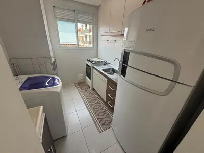 A cozinha ou kitchenette de Cód 73 - Apto no Brisa do Arvoredo a 80m do mar