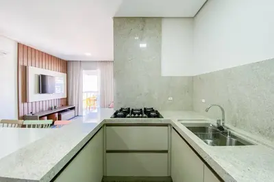 A cozinha ou kitchenette de Apartamento poucos metros da praia de Palmas - 0112