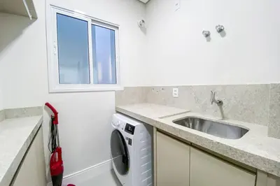 A cozinha ou kitchenette de Apartamento poucos metros da praia de Palmas - 0112