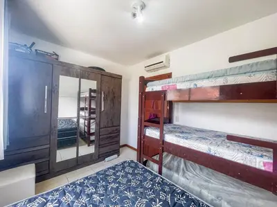 Uma cama ou camas num quarto em Apartamento de 2 quartos na Praia - 0325