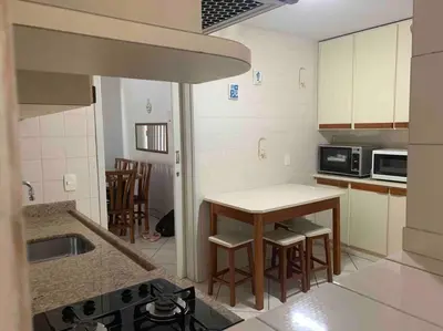 A cozinha ou kitchenette de Apartamento 50 metros do Mar