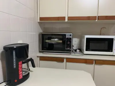 A cozinha ou kitchenette de Apartamento 50 metros do Mar