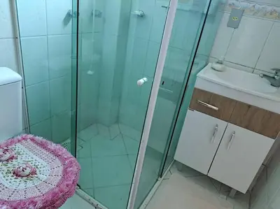 Uma casa de banho em Praia de Palmas 2 Qtos 2 suítes