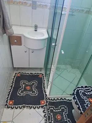 Uma casa de banho em Praia de Palmas 2 Qtos 2 suítes