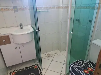 Uma casa de banho em Praia de Palmas 2 Qtos 2 suítes