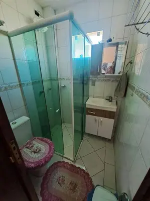 Uma casa de banho em Praia de Palmas 2 Qtos 2 suítes