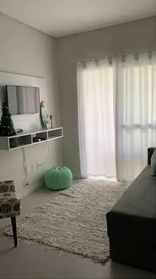 Uma cama ou camas num quarto em Apto Familiar em ótima praia!
