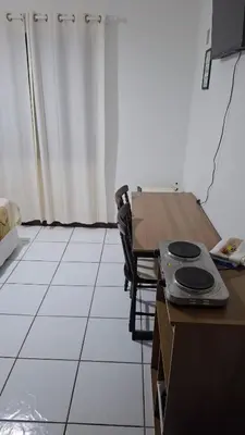 Uma televisão e/ou sistema de entretenimento em Residencial DO MAR