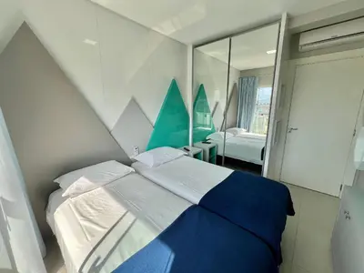Uma cama ou camas num quarto em Residencial Mario Guilherme