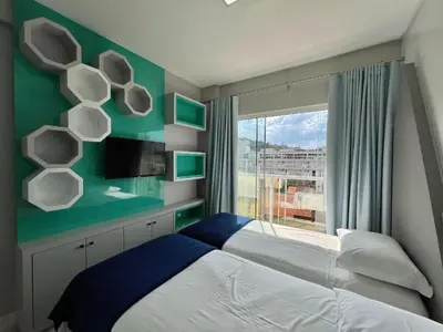 Uma cama ou camas num quarto em Residencial Mario Guilherme