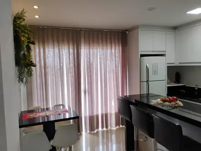 A cozinha ou kitchenette de Apartamento alto padrão de 2 quartos com vista mar em itapema