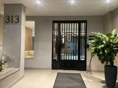 Uma área de estar em Apartamento alto padrão de 2 quartos com vista mar em itapema