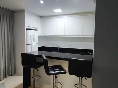 A cozinha ou kitchenette de Apartamento alto padrão de 2 quartos com vista mar em itapema