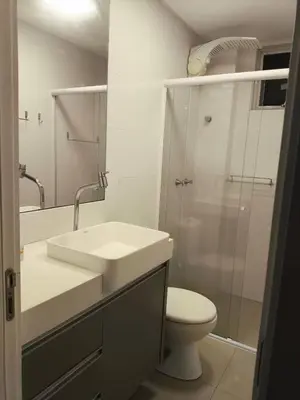 Uma casa de banho em Apartamento alto padrão de 2 quartos com vista mar em itapema