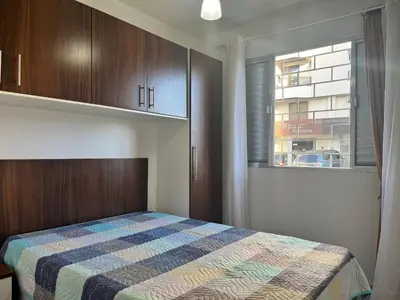 Uma cama ou camas num quarto em B208 - Apto 2 quartos Bombas perto do mar - SC