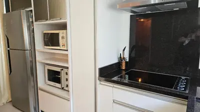 A planta de Apto Meia Praia Itapema SC com banheira,churrasqueira,garagem