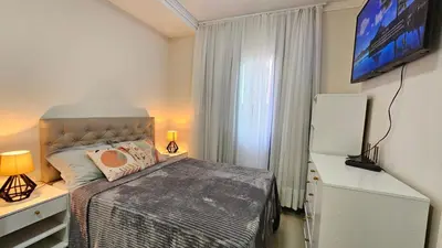 A planta de Apto Meia Praia Itapema SC com banheira,churrasqueira,garagem