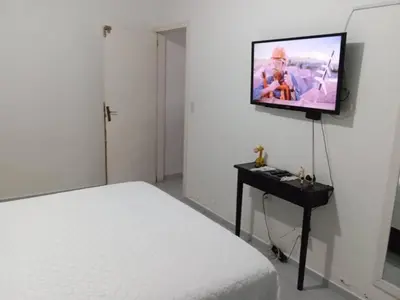 A planta de Casa confortável com amplo espaço a 800 m da praia