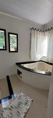 A planta de Casa 4 dormitórios em Itapema