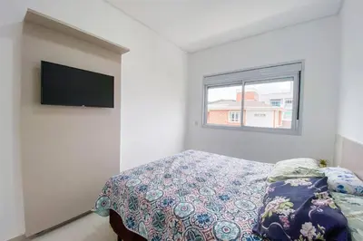 A planta de Apto Charmoso com 2 Quartos sendo uma Suíte - 0150