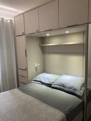 Uma cama ou camas num quarto em Apartamento meia praia 150m da praia