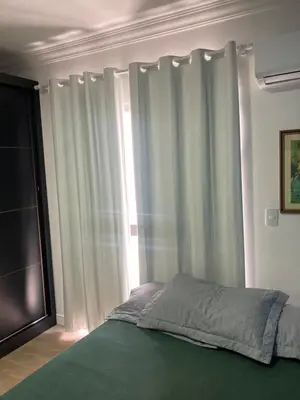 Uma cama ou camas num quarto em Apartamento meia praia 150m da praia